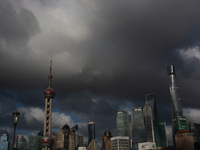 Dark clouds are forming above the Huangpu River in Shanghai, China, on July 25, 2024, as Typhoon Gaemi is heading toward China (