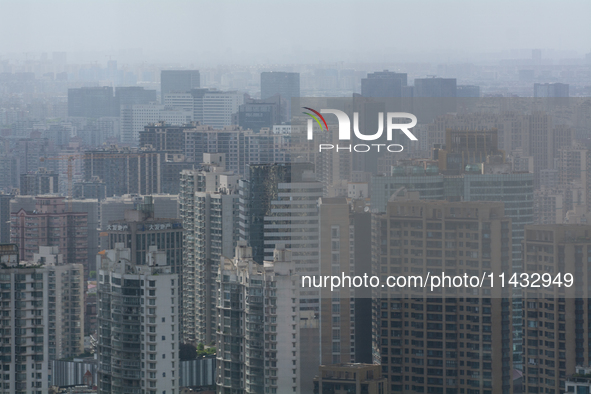 Dark clouds are appearing above the sky in Shanghai, China, on July 25, 2024, as Typhoon Gaemi is heading toward China 