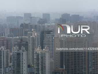 Dark clouds are appearing above the sky in Shanghai, China, on July 25, 2024, as Typhoon Gaemi is heading toward China (