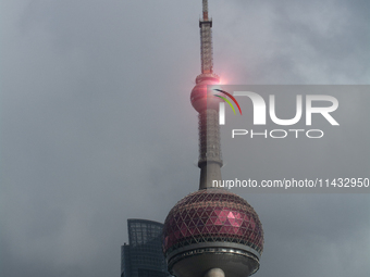 Dark clouds are forming above the Huangpu River in Shanghai, China, on July 25, 2024, as Typhoon Gaemi is heading toward China (