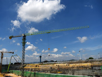 Construction workers are pouring concrete on the middle slab (platform floor) of the Changbei Airport Station of the Beijing-Hong Kong high-...