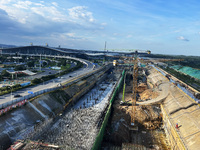 Construction workers are pouring concrete on the middle slab (platform floor) of the Changbei Airport Station of the Beijing-Hong Kong high-...