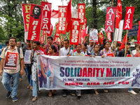 Various left front student organizations are seen during a solidarity march for Bangladesh students in Kolkata, India, on July 25, 2024, dem...