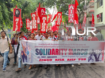 Various left front student organizations are seen during a solidarity march for Bangladesh students in Kolkata, India, on July 25, 2024, dem...