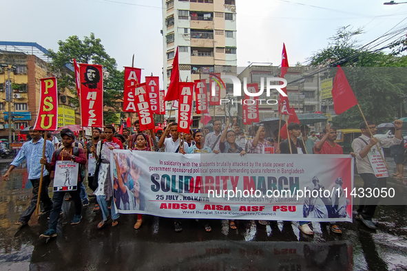 Various left front student organizations are seen during a solidarity march for Bangladesh students in Kolkata, India, on July 25, 2024, dem...