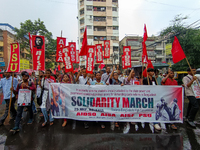 Various left front student organizations are seen during a solidarity march for Bangladesh students in Kolkata, India, on July 25, 2024, dem...