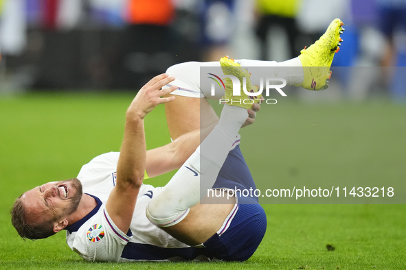 Harry Kane centre-forward of England and Bayern Munich lies injured on the pitch during the UEFA EURO 2024 semi-final match between Netherla...