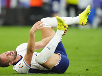 Harry Kane centre-forward of England and Bayern Munich lies injured on the pitch during the UEFA EURO 2024 semi-final match between Netherla...