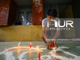 Nepali students affiliated with the Nepal Student Union, the student wing of the Nepali Congress, are holding a candlelight vigil in memory...