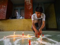 Nepali students affiliated with the Nepal Student Union, the student wing of the Nepali Congress, are holding a candlelight vigil in memory...