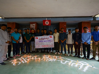 Nepali students affiliated with the Nepal Student Union, the student wing of the Nepali Congress, are holding a candlelight vigil in memory...