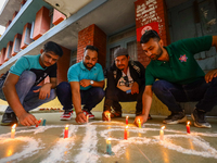 Nepali students affiliated with the Nepal Student Union, the student wing of the Nepali Congress, are holding a candlelight vigil in memory...