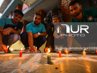 Nepali students affiliated with the Nepal Student Union, the student wing of the Nepali Congress, are holding a candlelight vigil in memory...