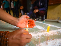 Nepali students affiliated with the Nepal Student Union, the student wing of the Nepali Congress, are holding a candlelight vigil in memory...