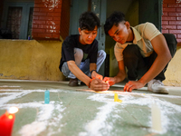 Nepali students affiliated with the Nepal Student Union, the student wing of the Nepali Congress, are holding a candlelight vigil in memory...