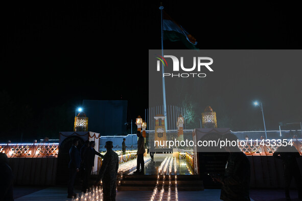 A view is showing the illuminated war memorial during the ''Vijay Diwas'' or Victory Day celebration in Drass, about 160 km (99 miles) east...