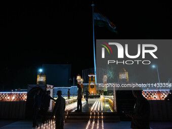 A view is showing the illuminated war memorial during the ''Vijay Diwas'' or Victory Day celebration in Drass, about 160 km (99 miles) east...