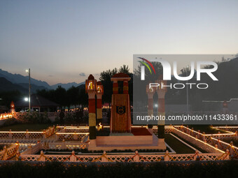 A view is showing the illuminated war memorial during the ''Vijay Diwas'' or Victory Day celebration in Drass, about 160 km (99 miles) east...