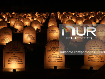 A view is showing the illuminated war memorial during the ''Vijay Diwas'' or Victory Day celebration in Drass, about 160 km (99 miles) east...