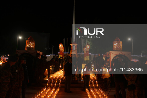 A view is showing the illuminated war memorial during the ''Vijay Diwas'' or Victory Day celebration in Drass, about 160 km (99 miles) east...