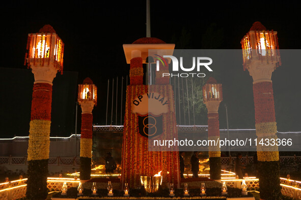 A view is showing the illuminated war memorial during the ''Vijay Diwas'' or Victory Day celebration in Drass, about 160 km (99 miles) east...