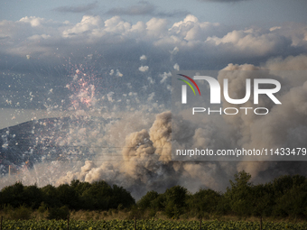 An explosion and fire are occurring in firework warehouses near the village of Elin Pelin Station, 30 kilometers from Sofia, Bulgaria, on Ju...