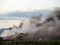 An explosion and fire are occurring in firework warehouses near the village of Elin Pelin Station, 30 kilometers from Sofia, Bulgaria, on Ju...