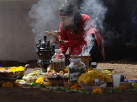 They are performing a pre-Hispanic ceremony to Mother Earth during the presentation of the strategic project for the conservation of the Cem...