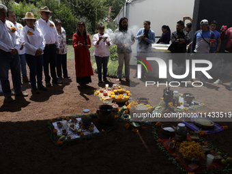 They are performing a pre-Hispanic ceremony to Mother Earth during the presentation of the strategic project for the conservation of the Cem...