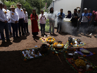 They are performing a pre-Hispanic ceremony to Mother Earth during the presentation of the strategic project for the conservation of the Cem...