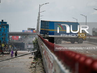 A truck is blocking the road following a clash between anti-quota protesters and the police in Dhaka, Bangladesh, on July 20, 2024. (