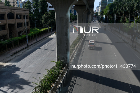 An ambulance is moving towards Dhaka Medical College Hospital in Dhaka, Bangladesh, on Saturday, July 20, 2024. 