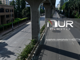 An ambulance is moving towards Dhaka Medical College Hospital in Dhaka, Bangladesh, on Saturday, July 20, 2024. (