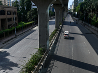 An ambulance is moving towards Dhaka Medical College Hospital in Dhaka, Bangladesh, on Saturday, July 20, 2024. (