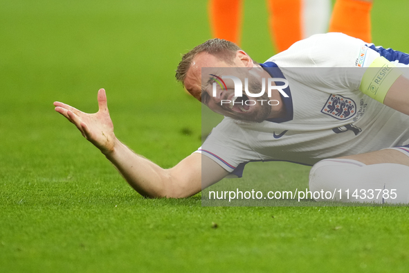 Harry Kane centre-forward of England and Bayern Munich lies injured on the pitch during the UEFA EURO 2024 semi-final match between Netherla...