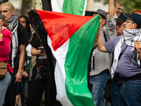 Several hundred people are gathering at Place de la Republique, in Paris, France, on July 25, 2024, to denounce the social and environmental...