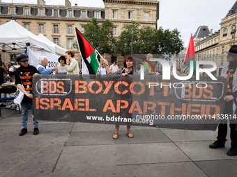 Several hundred people are gathering at Place de la Republique, in Paris, France, on July 25, 2024, to denounce the social and environmental...