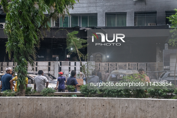 A view of a burnt building is showing after students are setting it on fire amid the ongoing anti-quota protest in Dhaka, Bangladesh, on Jul...