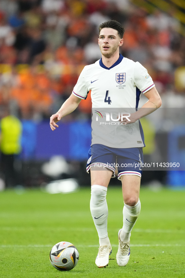 Declan Rice defensive midfield of England and Arsenal FC during the UEFA EURO 2024 semi-final match between Netherlands and England at Footb...