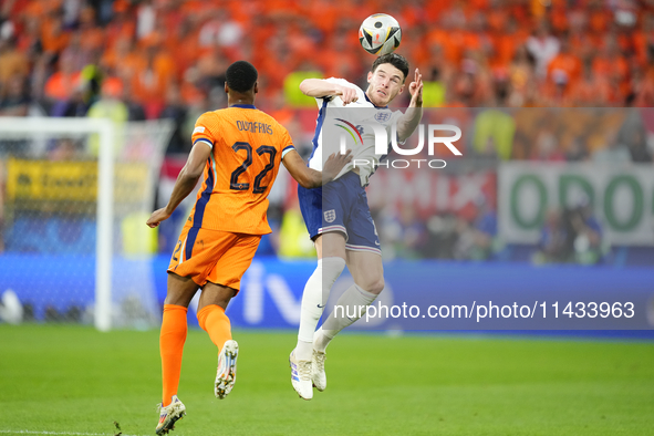 Declan Rice defensive midfield of England and Arsenal FC during the UEFA EURO 2024 semi-final match between Netherlands and England at Footb...