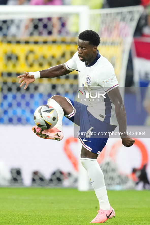  Marc Guehi centre-back of England and Crystal Palace controls the ball during the UEFA EURO 2024 semi-final match between Netherlands and E...