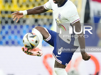  Marc Guehi centre-back of England and Crystal Palace controls the ball during the UEFA EURO 2024 semi-final match between Netherlands and E...