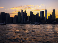  A view on Manhattan sklyline during sunset over the East River in New York City, United States of America on July 7th, 2024.  (