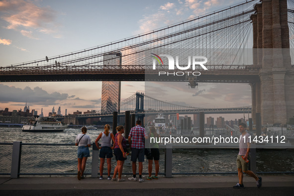  A view on Brooklyn Bridge and Manhattan Bridge  in New York City, United States of America on July 7th, 2024.  