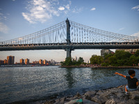  A view on Manhattan Bridge and Pebble Beach in New York City, United States of America on July 7th, 2024.  (