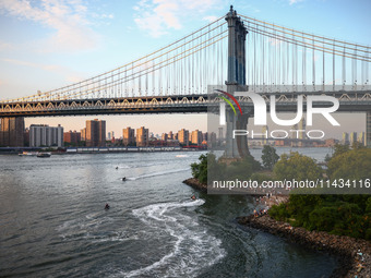  A view on Manhattan Bridge and Pebble Beach in New York City, United States of America on July 7th, 2024.  (