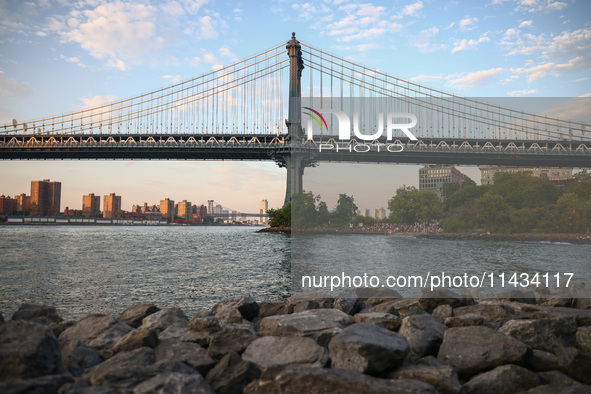  A view on Manhattan Bridge and Pebble Beach in New York City, United States of America on July 7th, 2024.  