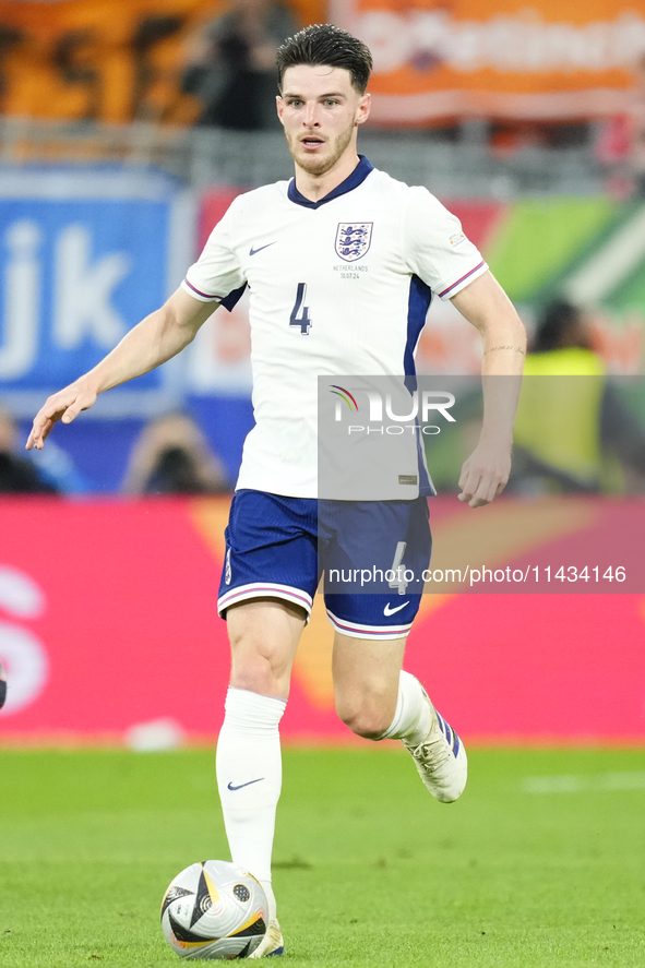 Declan Rice defensive midfield of England and Arsenal FC during the UEFA EURO 2024 semi-final match between Netherlands and England at Footb...