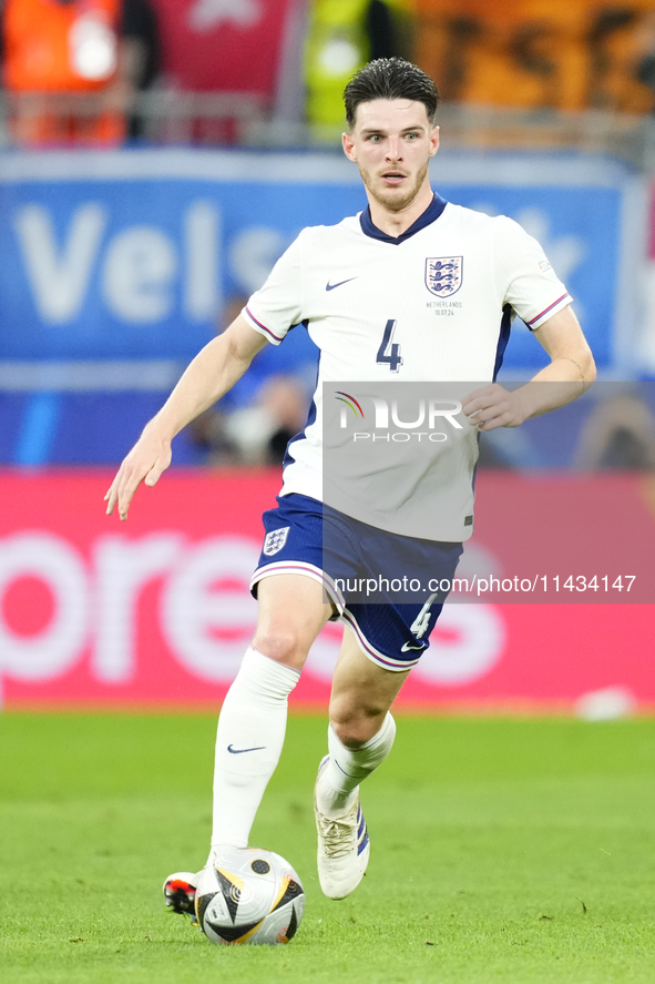 Declan Rice defensive midfield of England and Arsenal FC during the UEFA EURO 2024 semi-final match between Netherlands and England at Footb...