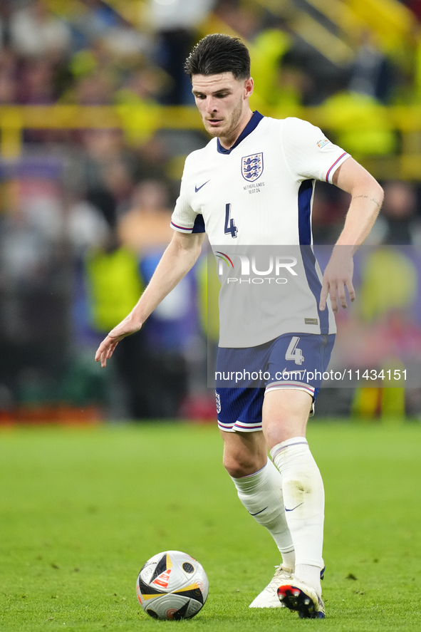 Declan Rice defensive midfield of England and Arsenal FC during the UEFA EURO 2024 semi-final match between Netherlands and England at Footb...